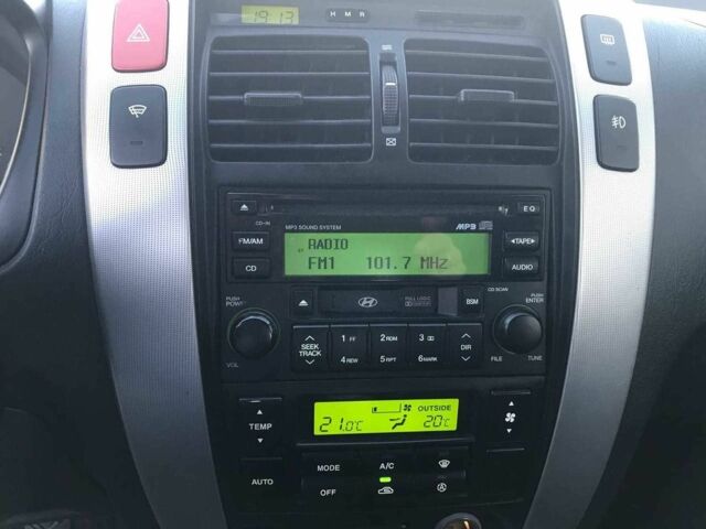 Синий Хендай Туксон, объемом двигателя 2 л и пробегом 207 тыс. км за 6890 $, фото 3 на Automoto.ua