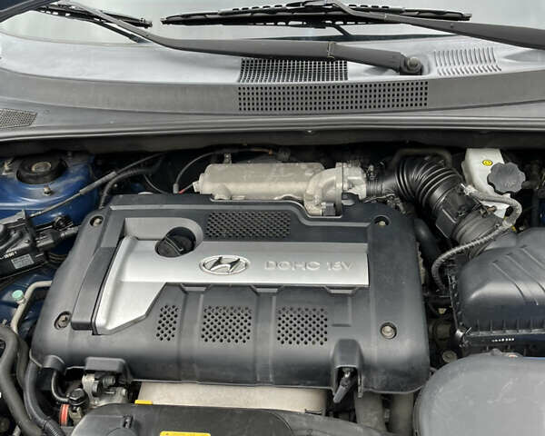 Синій Хендай Туксон, об'ємом двигуна 1.98 л та пробігом 230 тис. км за 6555 $, фото 16 на Automoto.ua