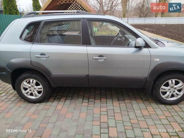Синий Хендай Туксон, объемом двигателя 2 л и пробегом 213 тыс. км за 8900 $, фото 9 на Automoto.ua