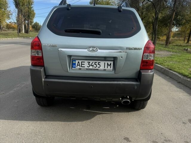 Синий Хендай Туксон, объемом двигателя 2 л и пробегом 198 тыс. км за 7999 $, фото 3 на Automoto.ua