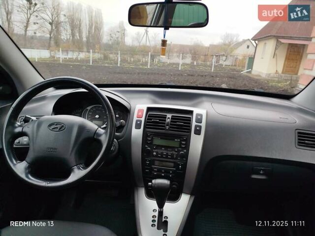 Синий Хендай Туксон, объемом двигателя 2 л и пробегом 213 тыс. км за 8900 $, фото 59 на Automoto.ua