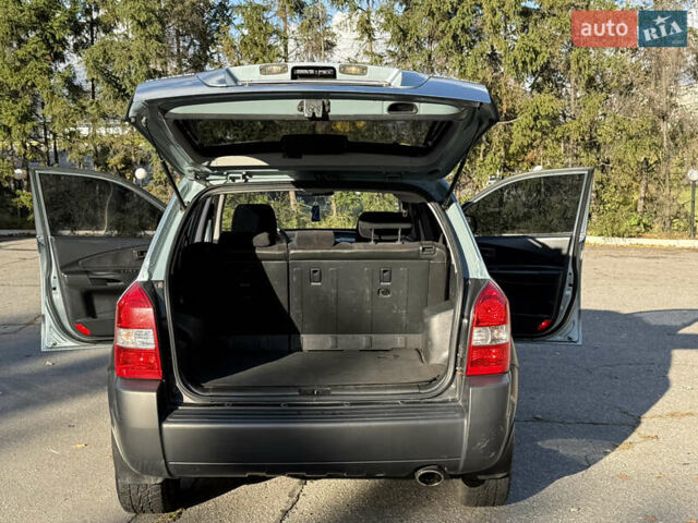 Синий Хендай Туксон, объемом двигателя 2 л и пробегом 204 тыс. км за 7350 $, фото 26 на Automoto.ua