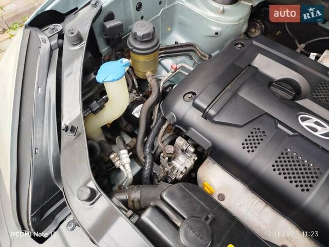 Синий Хендай Туксон, объемом двигателя 2 л и пробегом 213 тыс. км за 8900 $, фото 83 на Automoto.ua