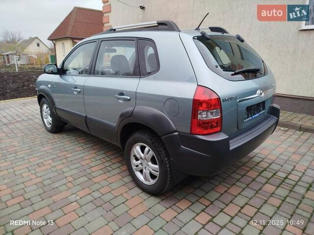 Синий Хендай Туксон, объемом двигателя 2 л и пробегом 213 тыс. км за 8900 $, фото 15 на Automoto.ua