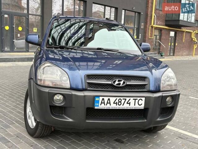Синий Хендай Туксон, объемом двигателя 1.98 л и пробегом 163 тыс. км за 7990 $, фото 6 на Automoto.ua