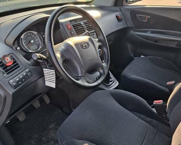 Синій Хендай Туксон, об'ємом двигуна 2 л та пробігом 158 тис. км за 8500 $, фото 11 на Automoto.ua