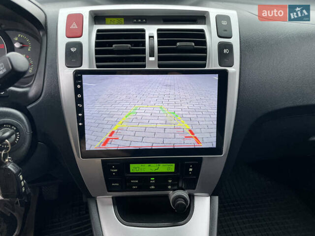 Синий Хендай Туксон, объемом двигателя 1.98 л и пробегом 163 тыс. км за 8000 $, фото 22 на Automoto.ua