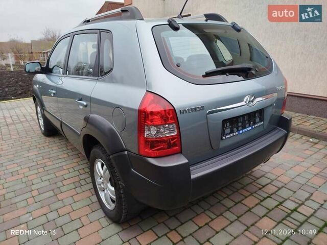 Синий Хендай Туксон, объемом двигателя 2 л и пробегом 213 тыс. км за 8900 $, фото 14 на Automoto.ua