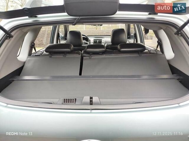 Синий Хендай Туксон, объемом двигателя 2 л и пробегом 213 тыс. км за 8900 $, фото 71 на Automoto.ua