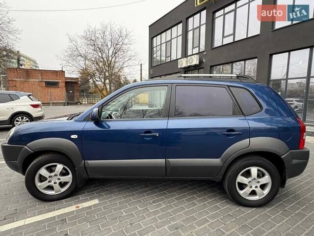 Синий Хендай Туксон, объемом двигателя 1.98 л и пробегом 163 тыс. км за 7990 $, фото 1 на Automoto.ua