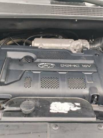 Синій Хендай Туксон, об'ємом двигуна 1.98 л та пробігом 216 тис. км за 8500 $, фото 4 на Automoto.ua