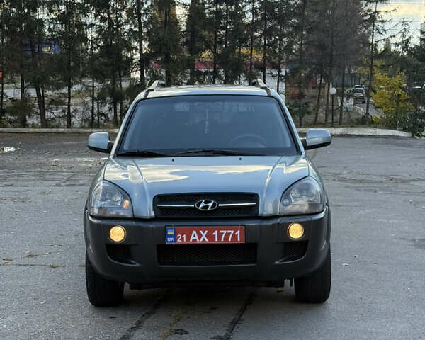 Синий Хендай Туксон, объемом двигателя 2 л и пробегом 204 тыс. км за 7350 $, фото 8 на Automoto.ua