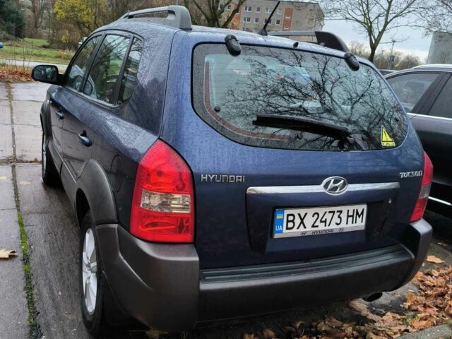 Синий Хендай Туксон, объемом двигателя 2 л и пробегом 156 тыс. км за 6850 $, фото 5 на Automoto.ua