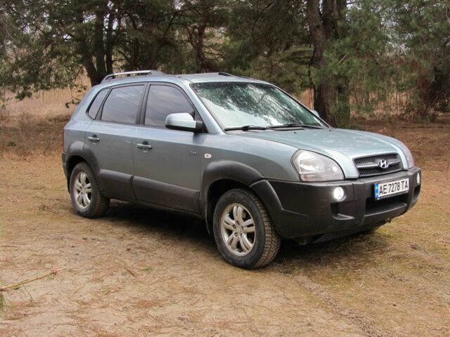 Синий Хендай Туксон, объемом двигателя 2 л и пробегом 180 тыс. км за 8000 $, фото 4 на Automoto.ua