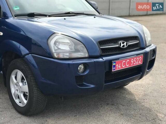 Синий Хендай Туксон, объемом двигателя 2 л и пробегом 178 тыс. км за 8500 $, фото 9 на Automoto.ua