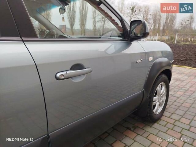 Синий Хендай Туксон, объемом двигателя 2 л и пробегом 213 тыс. км за 8900 $, фото 30 на Automoto.ua