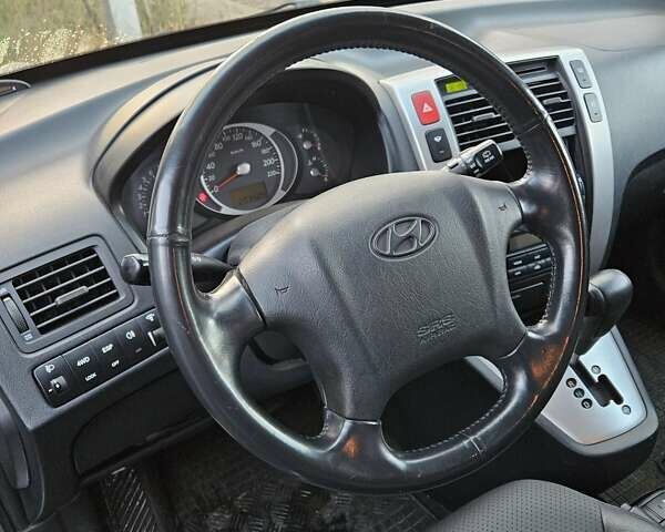 Синій Хендай Туксон, об'ємом двигуна 1.98 л та пробігом 203 тис. км за 8200 $, фото 9 на Automoto.ua