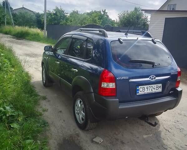 Синій Хендай Туксон, об'ємом двигуна 1.98 л та пробігом 190 тис. км за 7900 $, фото 1 на Automoto.ua