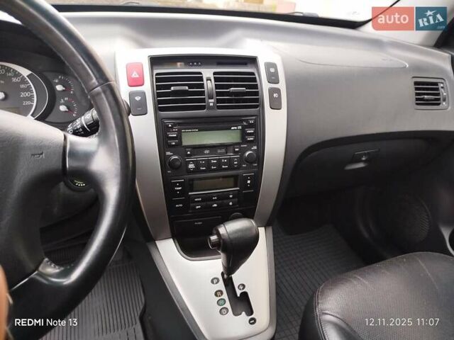 Синий Хендай Туксон, объемом двигателя 2 л и пробегом 213 тыс. км за 8900 $, фото 48 на Automoto.ua