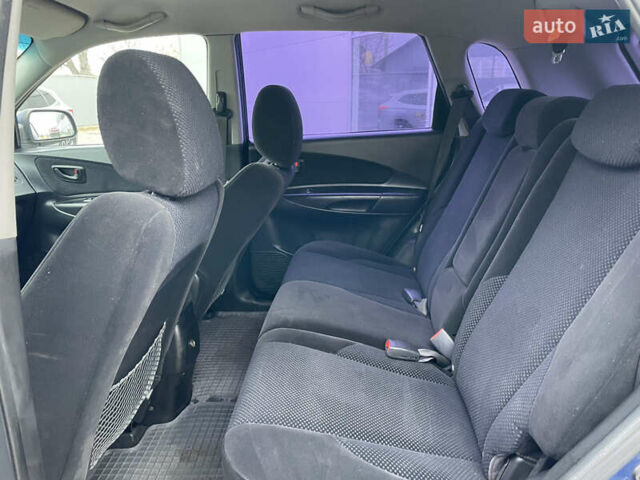 Синий Хендай Туксон, объемом двигателя 1.98 л и пробегом 163 тыс. км за 8000 $, фото 12 на Automoto.ua