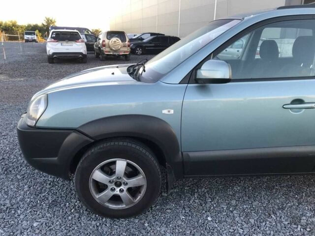 Синий Хендай Туксон, объемом двигателя 2 л и пробегом 207 тыс. км за 6890 $, фото 21 на Automoto.ua