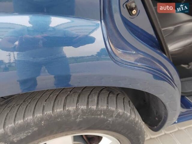 Синий Хендай Туксон, объемом двигателя 1.98 л и пробегом 201 тыс. км за 9400 $, фото 1 на Automoto.ua