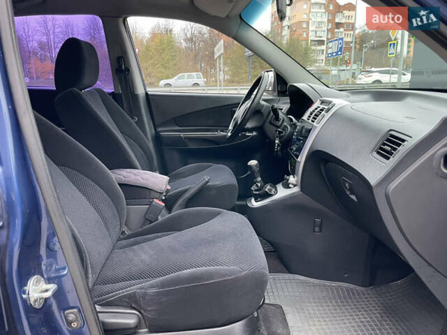 Синий Хендай Туксон, объемом двигателя 1.98 л и пробегом 163 тыс. км за 8000 $, фото 18 на Automoto.ua