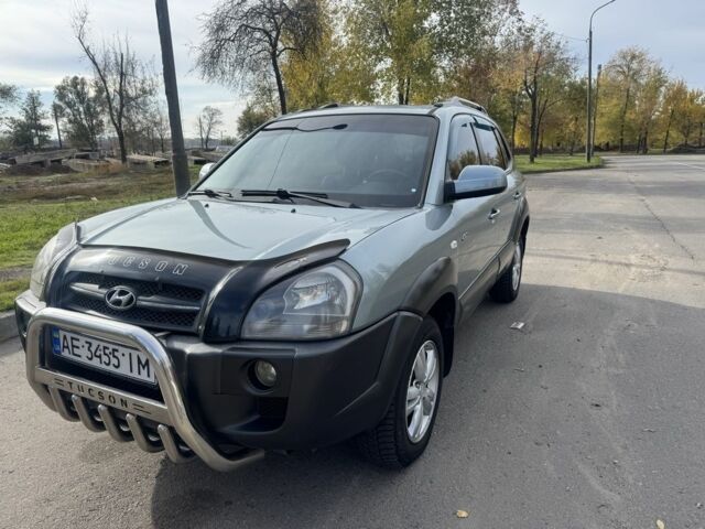 Синий Хендай Туксон, объемом двигателя 2 л и пробегом 198 тыс. км за 7999 $, фото 1 на Automoto.ua