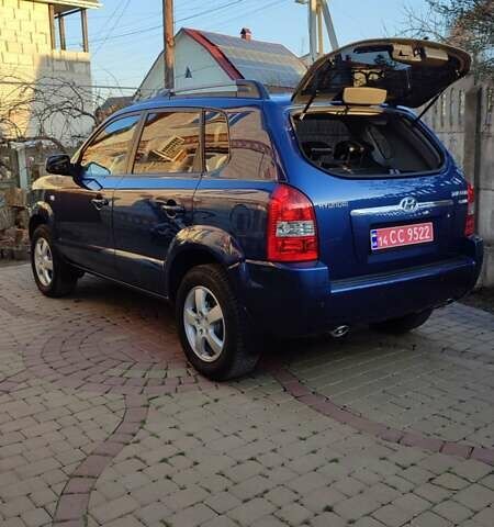 Синий Хендай Туксон, объемом двигателя 2 л и пробегом 178 тыс. км за 8500 $, фото 14 на Automoto.ua