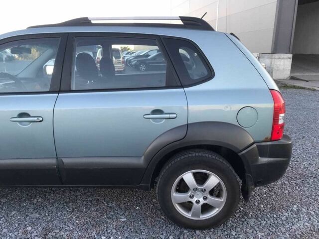 Синий Хендай Туксон, объемом двигателя 2 л и пробегом 207 тыс. км за 6890 $, фото 20 на Automoto.ua