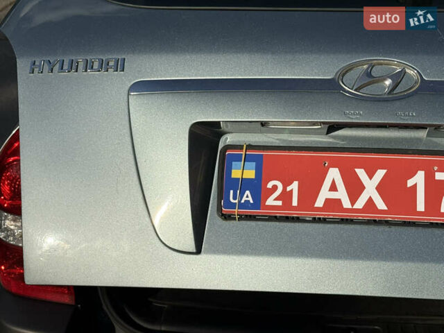 Синій Хендай Туксон, об'ємом двигуна 2 л та пробігом 203 тис. км за 7800 $, фото 21 на Automoto.ua