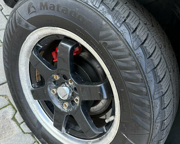 Синий Хендай Туксон, объемом двигателя 2 л и пробегом 205 тыс. км за 7500 $, фото 18 на Automoto.ua