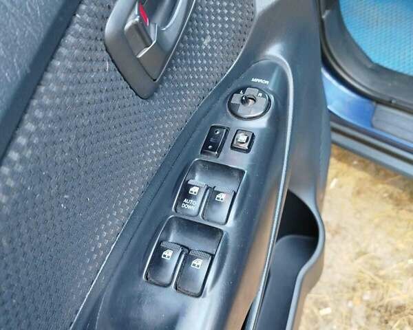 Синий Хендай Туксон, объемом двигателя 1.98 л и пробегом 267 тыс. км за 7300 $, фото 9 на Automoto.ua