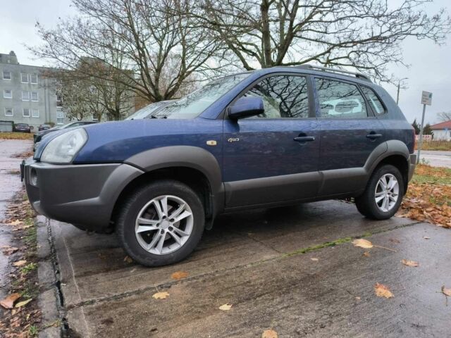 Синий Хендай Туксон, объемом двигателя 2 л и пробегом 156 тыс. км за 6850 $, фото 7 на Automoto.ua