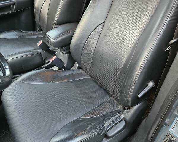 Синій Хендай Туксон, об'ємом двигуна 1.98 л та пробігом 203 тис. км за 8200 $, фото 12 на Automoto.ua