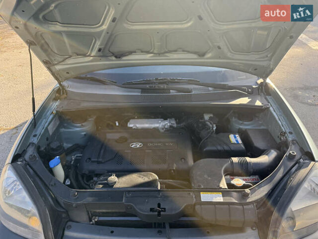 Синій Хендай Туксон, об'ємом двигуна 2 л та пробігом 203 тис. км за 7800 $, фото 23 на Automoto.ua