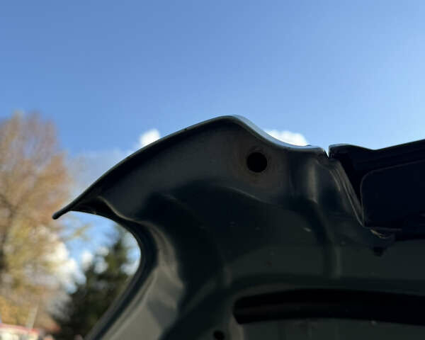 Синий Хендай Туксон, объемом двигателя 2 л и пробегом 205 тыс. км за 7500 $, фото 21 на Automoto.ua