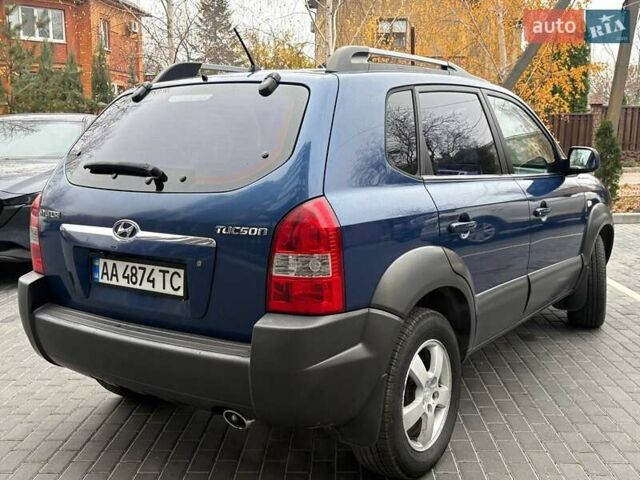 Синий Хендай Туксон, объемом двигателя 1.98 л и пробегом 163 тыс. км за 7990 $, фото 10 на Automoto.ua
