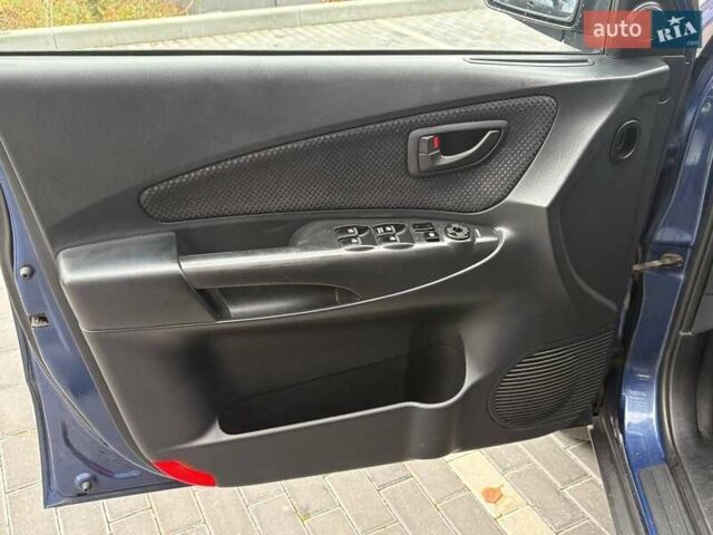 Синий Хендай Туксон, объемом двигателя 1.98 л и пробегом 163 тыс. км за 7990 $, фото 29 на Automoto.ua