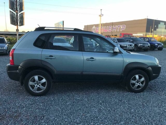 Синий Хендай Туксон, объемом двигателя 2 л и пробегом 207 тыс. км за 6890 $, фото 14 на Automoto.ua