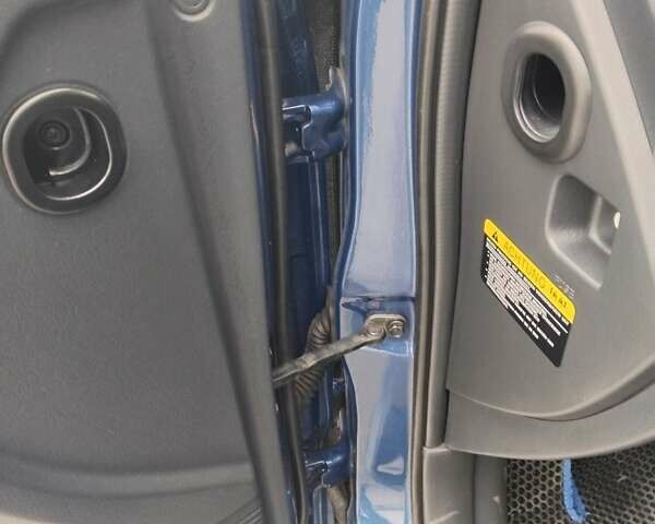 Синий Хендай Туксон, объемом двигателя 1.98 л и пробегом 201 тыс. км за 9400 $, фото 10 на Automoto.ua