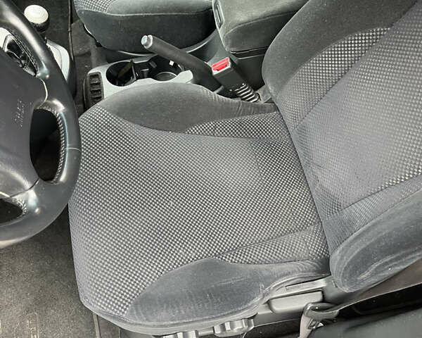 Синій Хендай Туксон, об'ємом двигуна 1.98 л та пробігом 230 тис. км за 6555 $, фото 11 на Automoto.ua