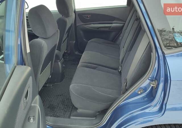 Синий Хендай Туксон, объемом двигателя 1.98 л и пробегом 228 тыс. км за 7700 $, фото 6 на Automoto.ua