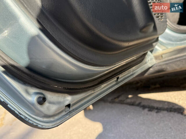 Синій Хендай Туксон, об'ємом двигуна 2 л та пробігом 203 тис. км за 7800 $, фото 16 на Automoto.ua
