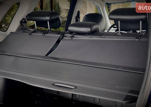 Синий Хендай Туксон, объемом двигателя 2 л и пробегом 204 тыс. км за 8500 $, фото 100 на Automoto.ua