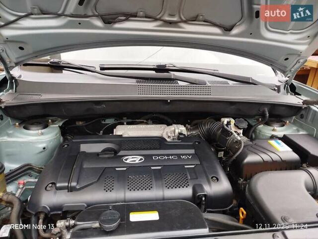 Синий Хендай Туксон, объемом двигателя 2 л и пробегом 213 тыс. км за 8900 $, фото 85 на Automoto.ua