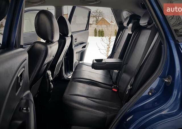 Синий Хендай Туксон, объемом двигателя 2 л и пробегом 204 тыс. км за 8500 $, фото 150 на Automoto.ua