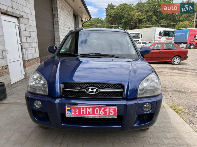 Синий Хендай Туксон, объемом двигателя 2 л и пробегом 218 тыс. км за 6700 $, фото 1 на Automoto.ua