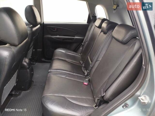 Синий Хендай Туксон, объемом двигателя 2 л и пробегом 213 тыс. км за 8900 $, фото 55 на Automoto.ua