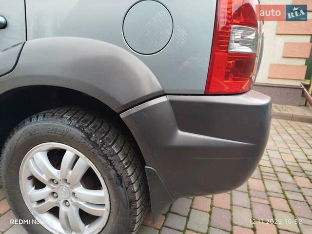 Синий Хендай Туксон, объемом двигателя 2 л и пробегом 213 тыс. км за 8900 $, фото 23 на Automoto.ua